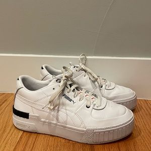 Puma Cali Sport repeat cat sneakers in white and black